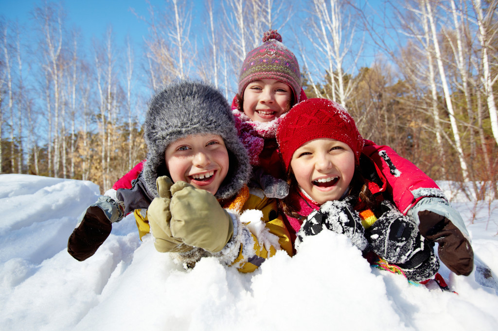 kids playing in snow snow days