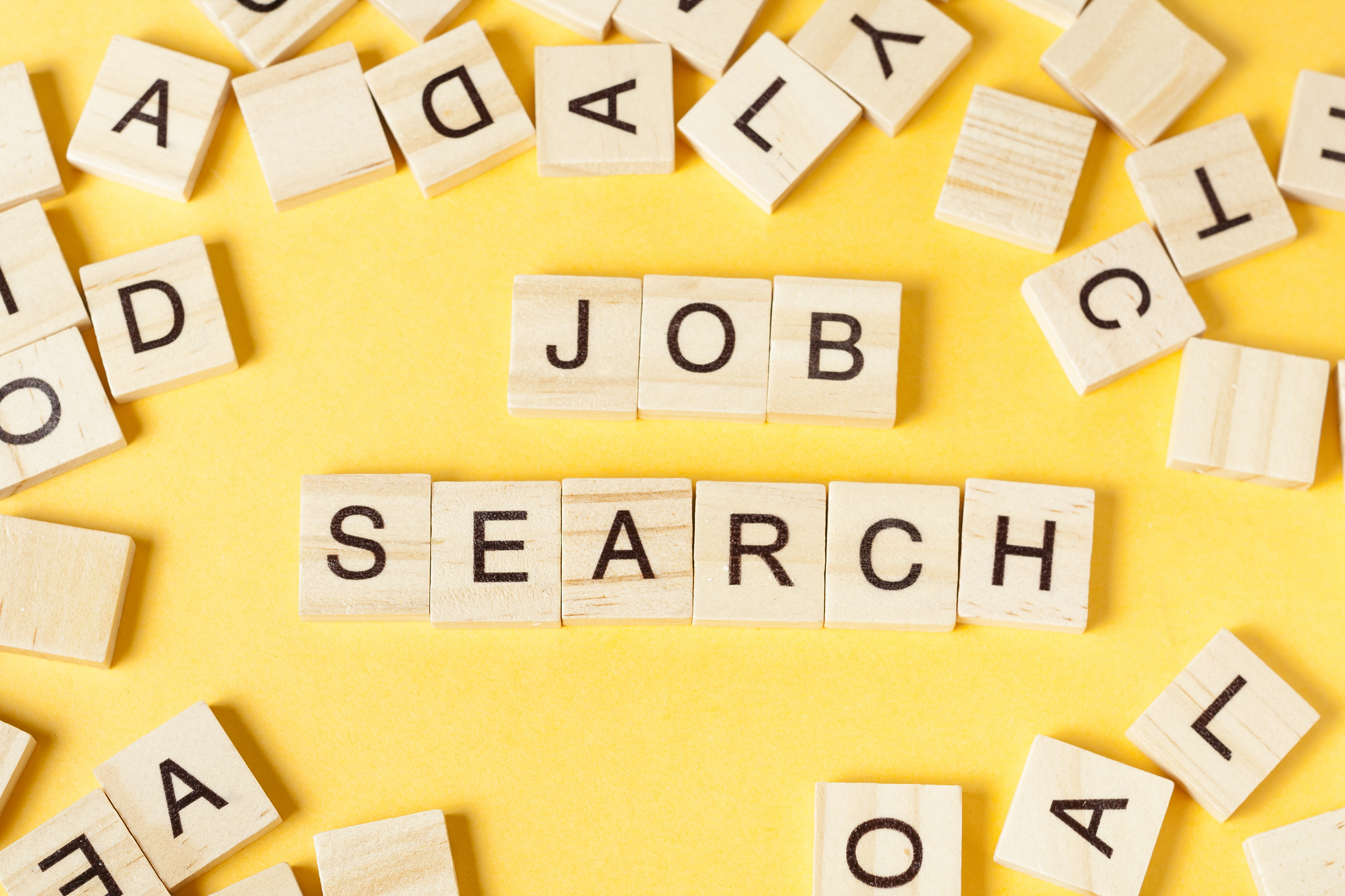Job search word written on wood block. Wooden ABC. virtual job search